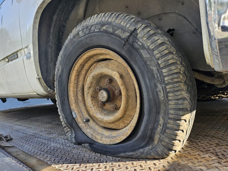 Anchorage Towing provided by Eagle Towing for an old, worn out, flat tire situation.